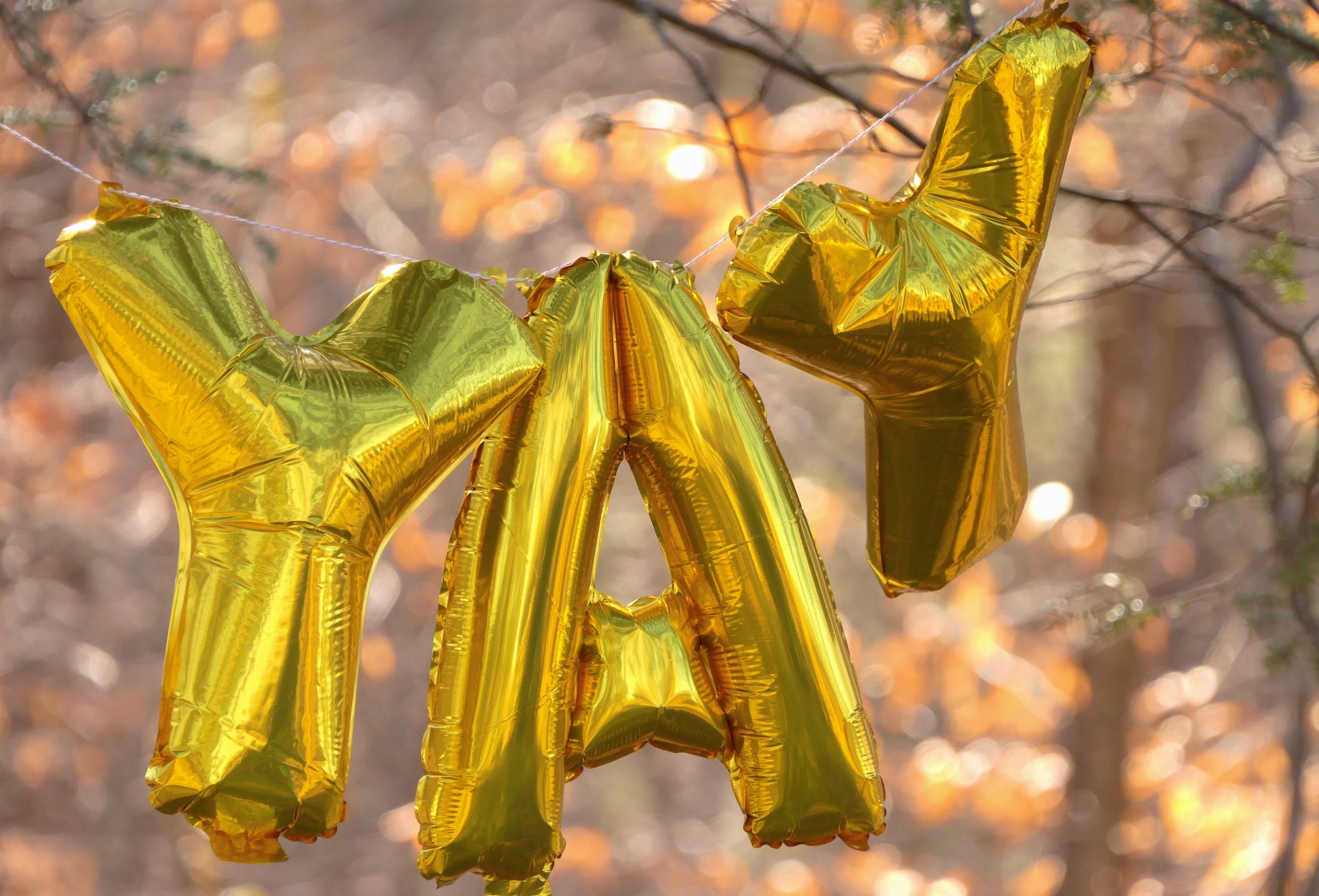 Image of balloons that spell YAY Photo by Patti Black on Unsplash